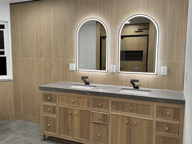Mirrors and light fixtures are among the easiest items to buy yourself. Faucets too, once I have checked the model.